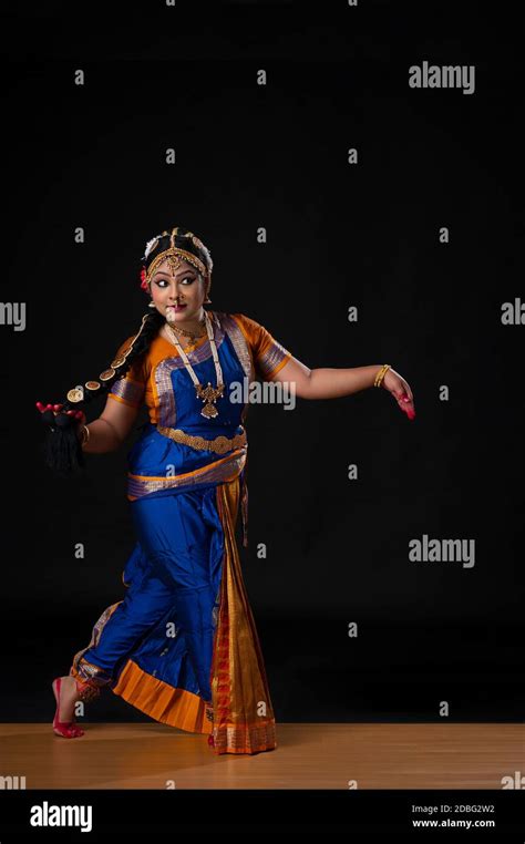 Kuchipudi dancer portraying Goddess Satyabhama wife of Lord Krishna walking on stage Stock Photo ...