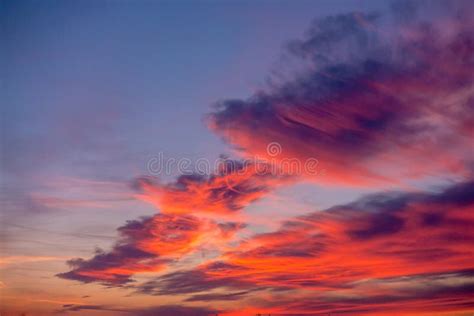 Pink clouds at a sunset stock image. Image of fantasy - 107164397