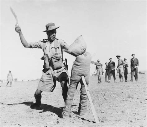 A Gurkha soldier demonstrates how to use the kukri fighting knife, 1944 ...