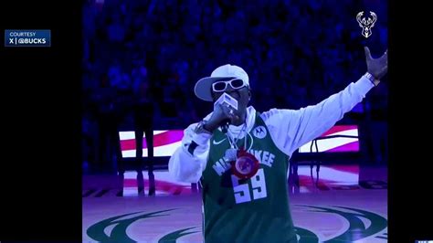 Flavor Flav sings national anthem at Bucks game