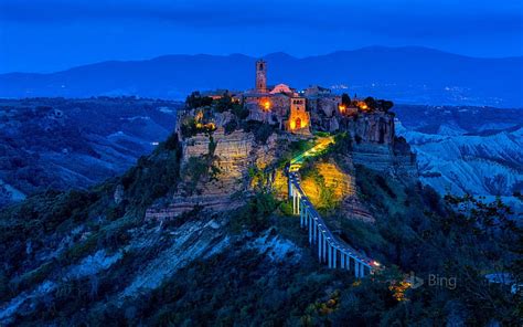 HD wallpaper: night, lights, rock, tower, village, Italy, Civita di Bagnoregio | Wallpaper Flare