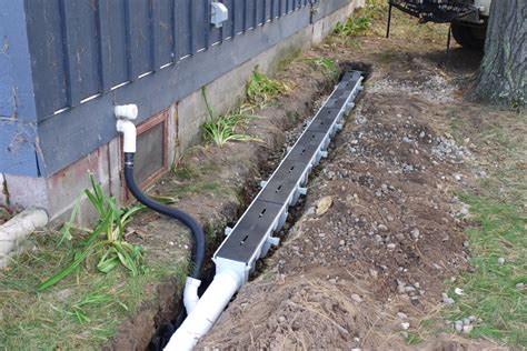 French Drain Installation | Backyard drainage, French drain installation, Yard drainage