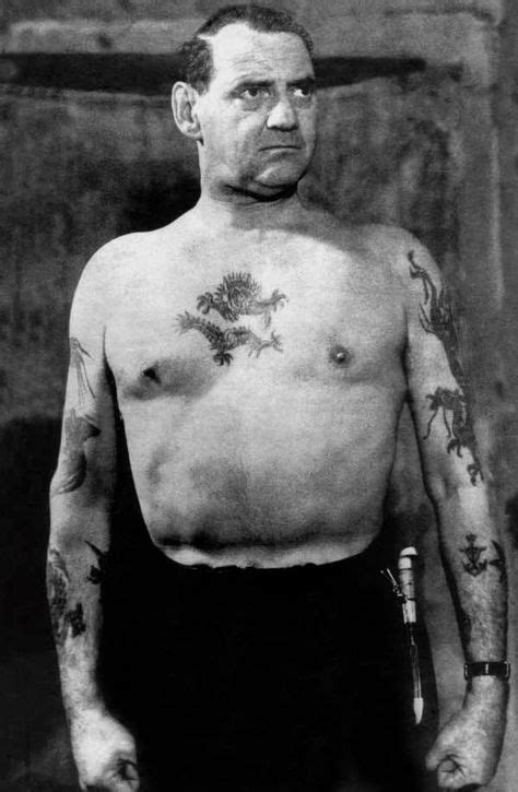 Frederick IX of Denmark, also known as The Sailor King, showing of his tattoos. Date unknown ...