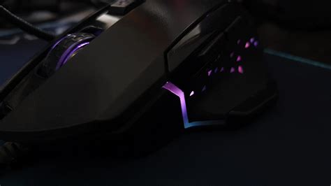 a black gaming mouse with twinkling lights. Special gaming mice have ...