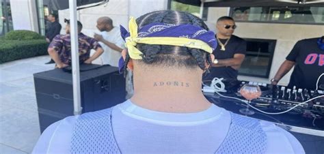 Drake gets neck tattoo of name of his son Adonis