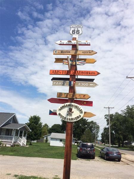 Williamsville Celebrates Route 66 International Traveler Multi-Directional Sign - Illinois Route ...