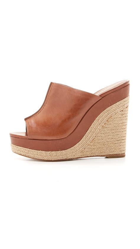 Lyst - Michael Kors Charlize Wedge Mules in Brown