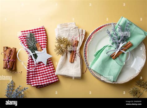 Christmas plate setting on golden surface copy space Stock Photo - Alamy