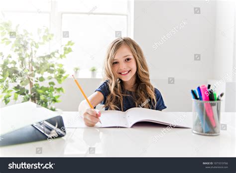 Child Girl Doing Homework Home Kitchen Stock Photo 1071019766 ...