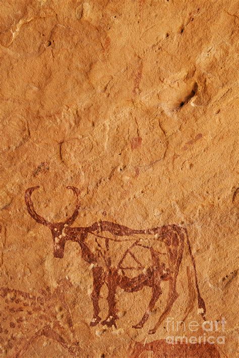 Ancient rock art in the Akakus Mountains in the Sahara Desert ...