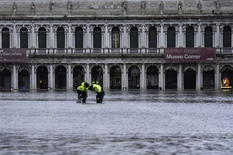 VENICE, ITALY - November 24, 2019: St. Marks Square Piazza San Marco during Flood Acqua Alta in ...