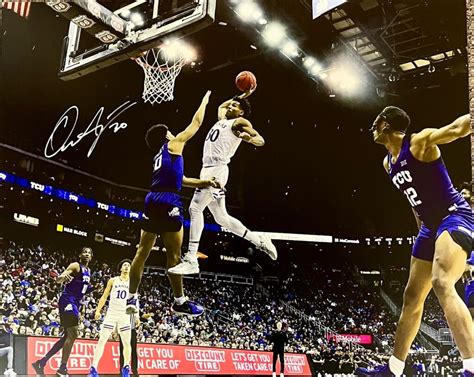 Jayhawk Autographs - Buy Ochai Agbaji Autographed 16"x20 Dunk Print