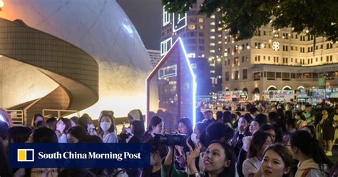 Thousands of celebrity spotters gather outside glitzy Louis Vuitton runway show as Hong Kong ...