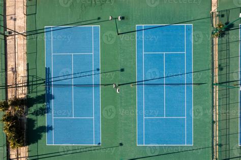 Aerial view of 2 tennis blue tennis courts. 5135310 Stock Photo at Vecteezy