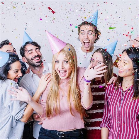 Premium Photo | Group of friends celebrating birthday with confetti