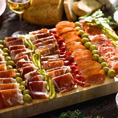 Cured Meats of Spain Sampler Plus Olives and Peppers | Cured meats, Food, Food presentation