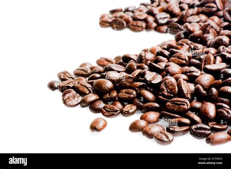 fresh italian roast coffee beans on white background Stock Photo - Alamy