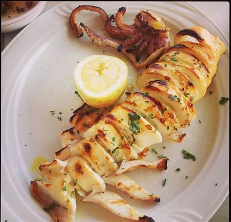 garlicky grilled squid stuffed with feta cheese | Culinary Concoctions | Grilled squid, Calamari ...