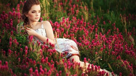 Download Lying Down Dress Brunette Field Flower Woman Mood HD Wallpaper