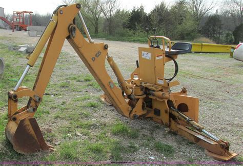 Case D125 backhoe attachment in Phillipsburg, MO | Item F4823 sold | Purple Wave