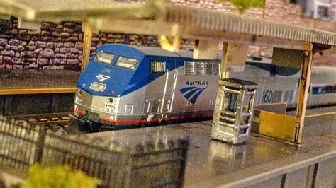 Amtrak P42 from the snow to the city arriving at sunset. N scale ...