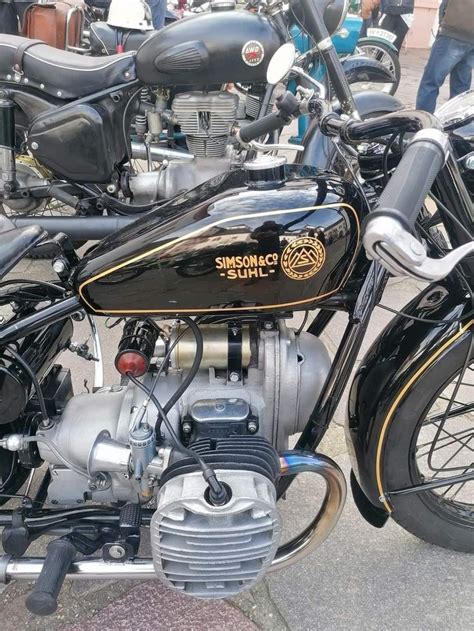 several motorcycles parked next to each other in a parking lot