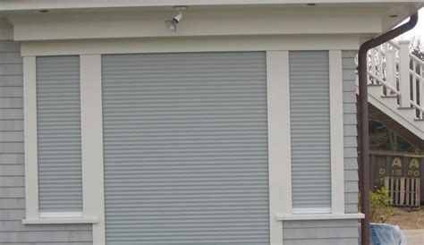 Hurricane Shutters in Three Different Styles From Rolladen