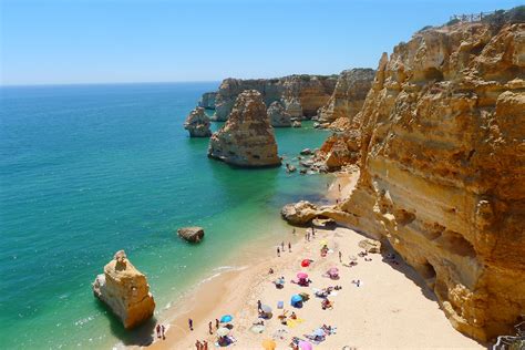Postcard Beautiful Beaches in Faro, the Portuguese Algarve - Iberia Joven