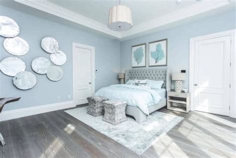 A Sky Blue Bedroom With A Cozy Decor