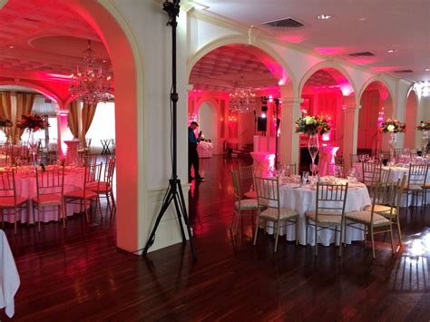 Pink up lighting for a wedding
