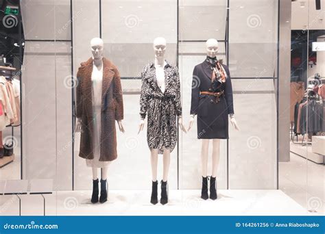 Mannequins in Fashion Shop Display Window Editorial Photo - Image of ...