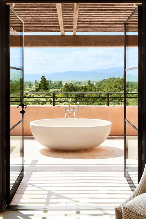 From Napa's olive groves and rolling vineyards rises Auberge du Soleil—a golden oasis ...