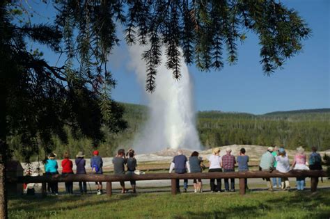 People admiring Old Faithful Eruption | Smithsonian Photo Contest ...