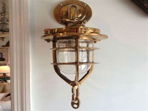 Nautical lighting, including chandeliers, coastal sconces, beach house lamps and ship lighting ...