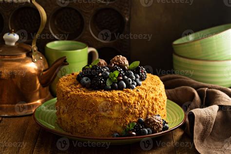 Caramel cake with honey and cream frosting 15761014 Stock Photo at Vecteezy