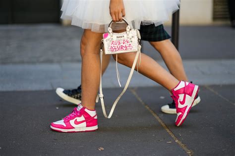 11 Outfit Ideas For Nike Dunks, From Pleated Skirts To Baggy Jeans