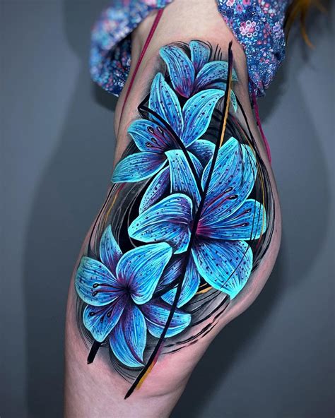 Blue Lilies, Girl's Hip Tattoo | Tattoo Ideas For Men & Women in 2024