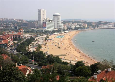 Qingdao Beach With Skyline by Carol Groenen