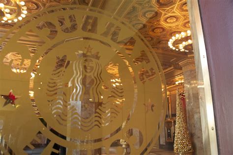 Gold Starbucks Logo on Gold Lobby With Gold Christmas Deco… | Flickr