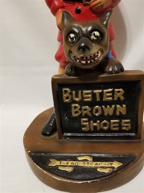 Buster Brown Shoes advertising statue. | Antiques Board