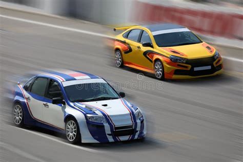 Two Racing Cars on a Racing Track Stock Photo - Image of moving, motor: 107218800