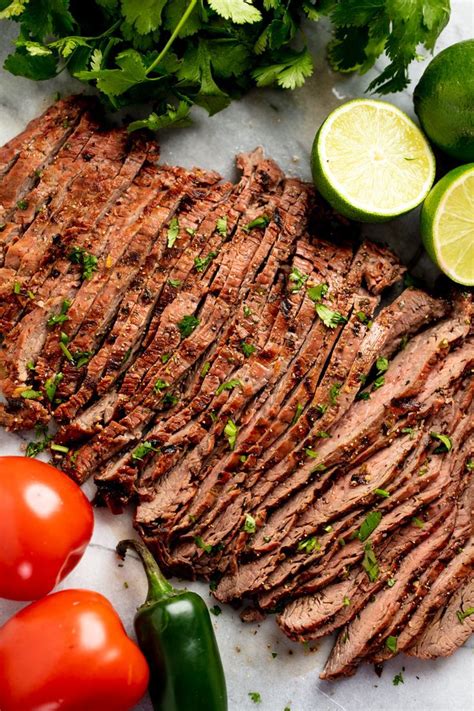 Marinated flank or skirt steak is grilled to perfection for the best Authentic Carne Asada ...