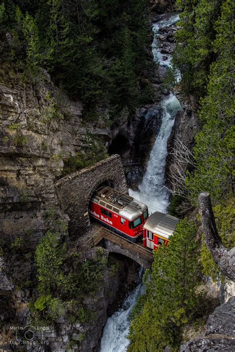 Bridge over troubled water - A short railway bridge over a waterfall between two tunnels. It's ...