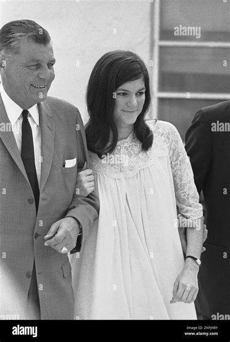 Barbara Jane Mackle and her father, Robert Mackle, posed briefly for photographers, Dec. 23 ...