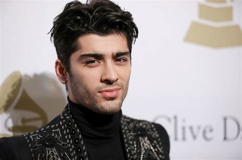 Zayn Malik Flaunts New Purple Hairstyle While Posing in a Garden | Billboard