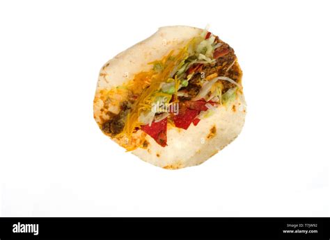 Taco Bell soft spicy loaded nacho taco open on white background Stock ...