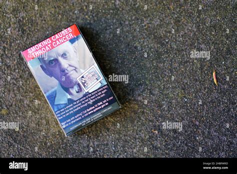 Smoking Causes Throat Cancer Cigarette Package Stock Photo - Alamy