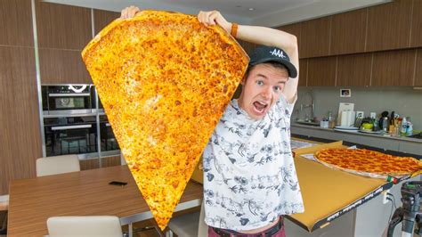 Eating the World's BIGGEST Slice of Pizza!! - YouTube