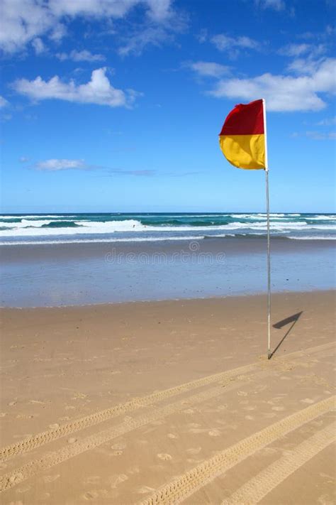 Red And Yellow Beach Safety Flag Stock Photo - Image of warning, bright ...