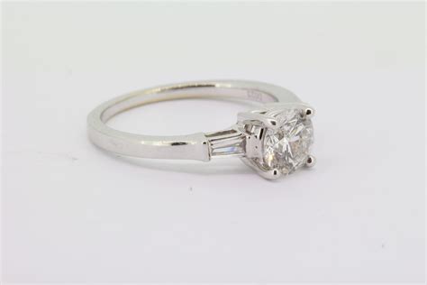 Diamond Solitaire Engagement Ring with Baguette Shoulders, 0.98 carats